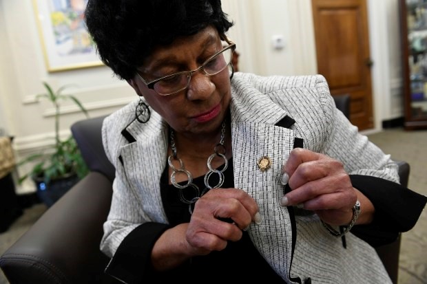 Albertine Sellers shows off her service pin for 60 years of working for the City of Denver on March 9, 2017 in Denver.