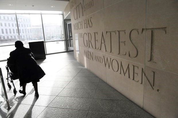 Albertine Sellers makes her way out of the Wellington E. Webb Municipal Office building on her way to the mayor's office on March 9, 2017 in Denver.